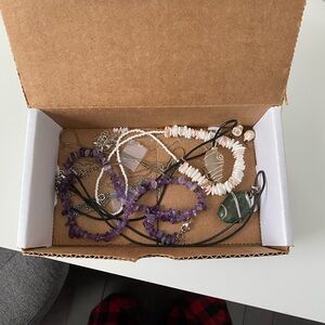Box of random jewelry, mostly necklaces